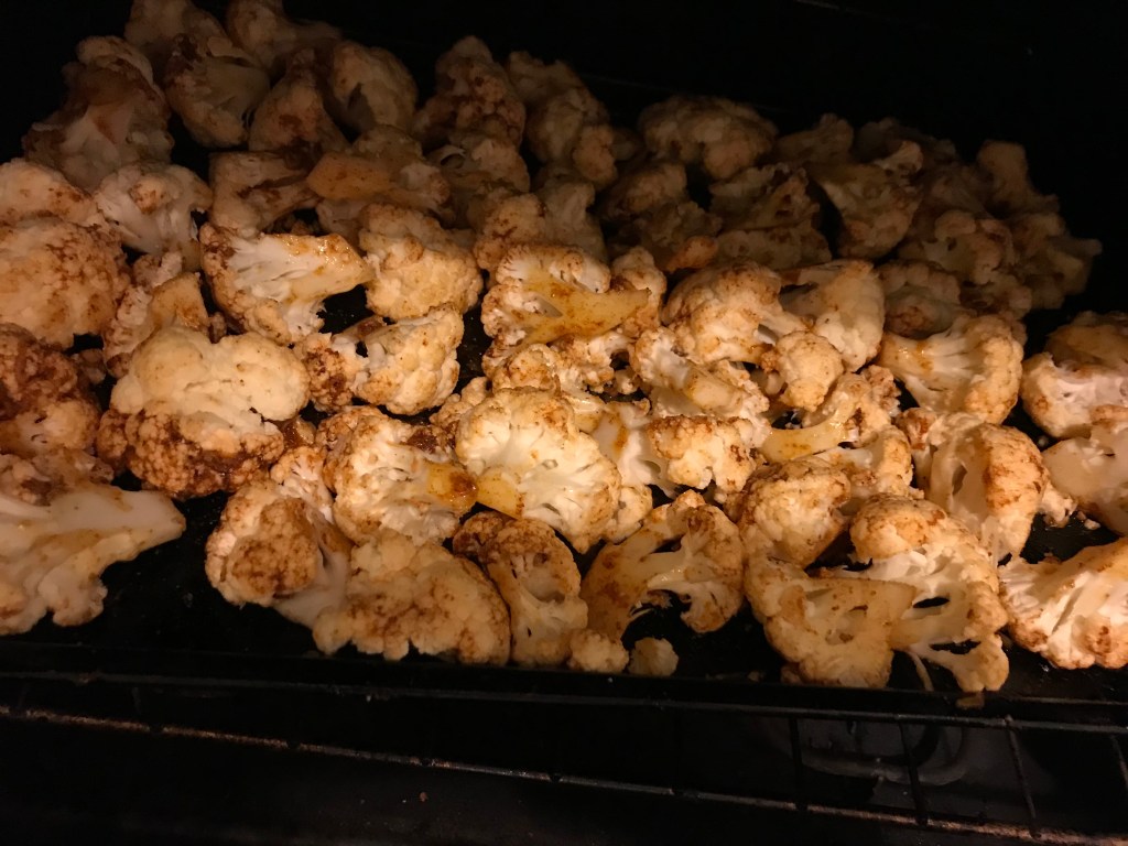 A photo of cauliflower roasting in the oven